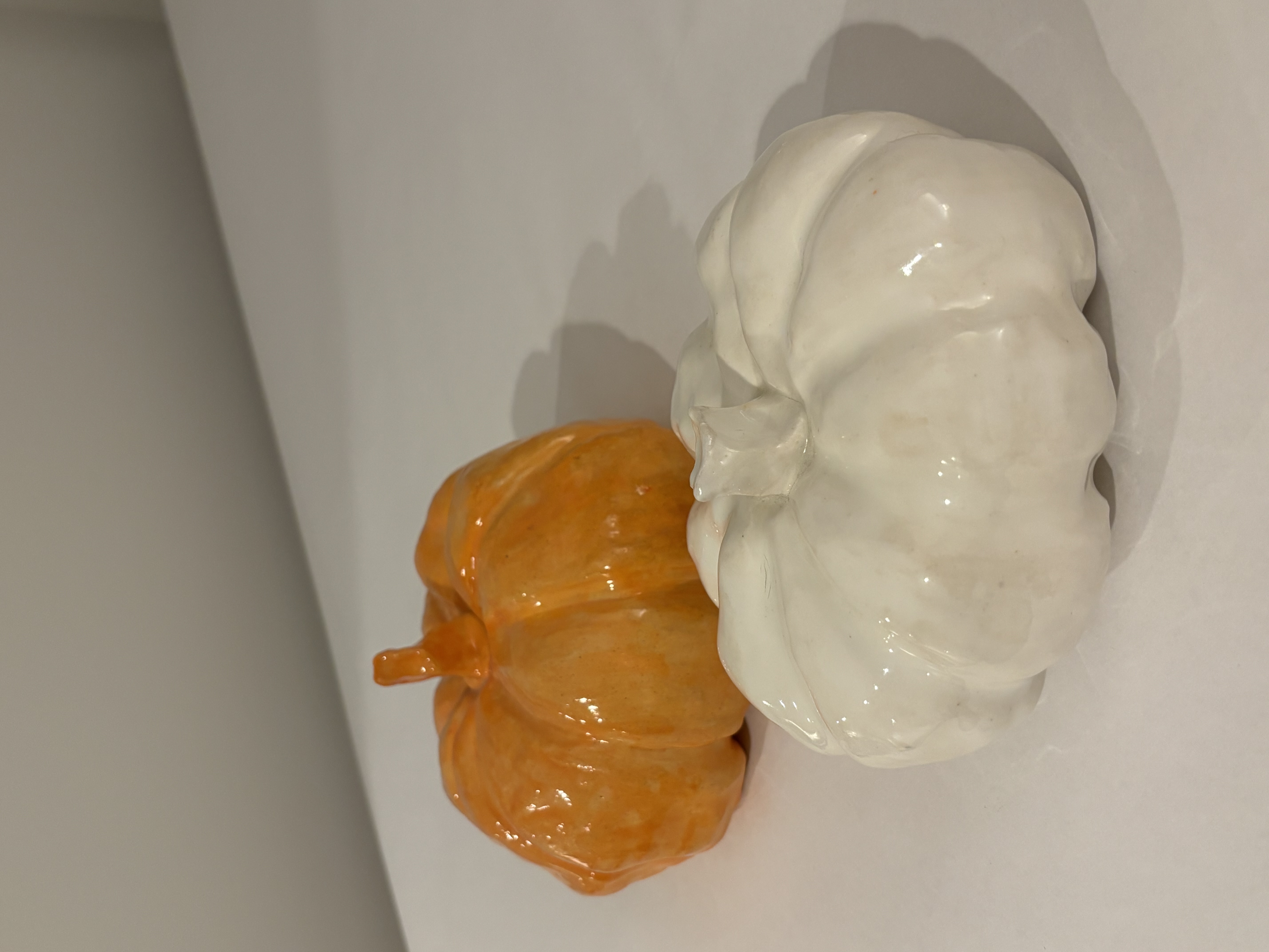 White and orange clay pumpkins